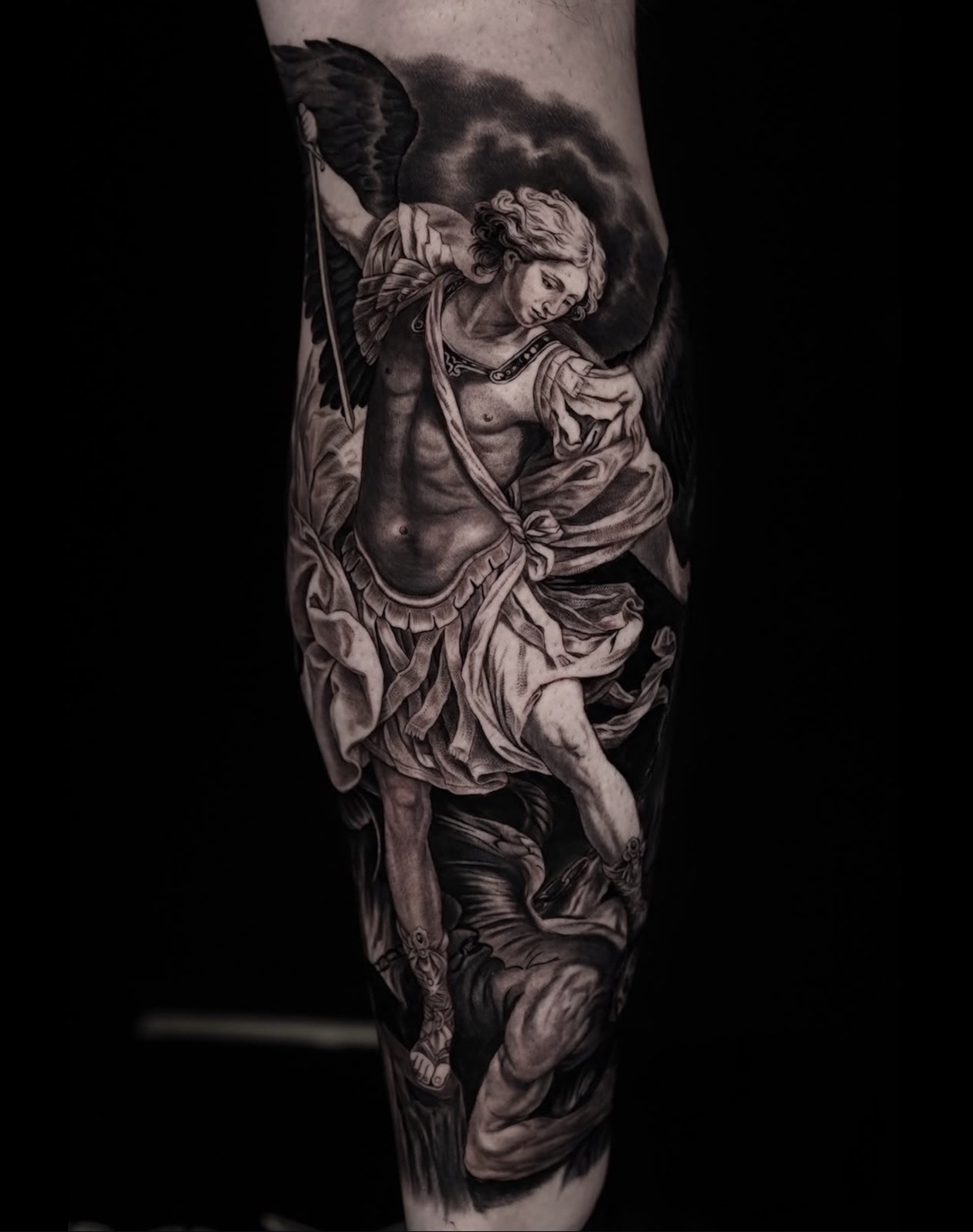 Black and grey Archangel Michael realism tattoo