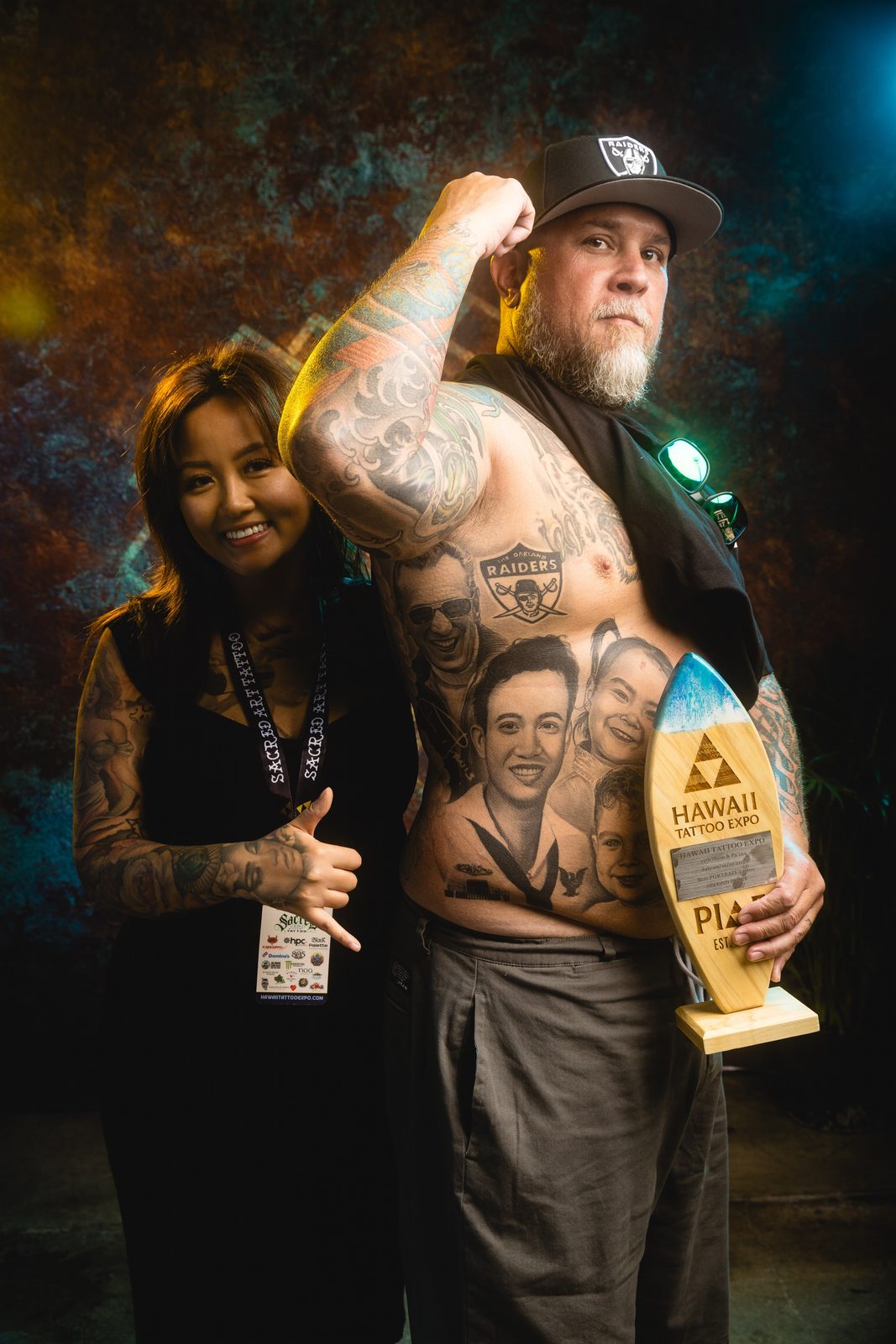 Lynn Hoang with an award-winning client at the Hawaii Tattoo Expo